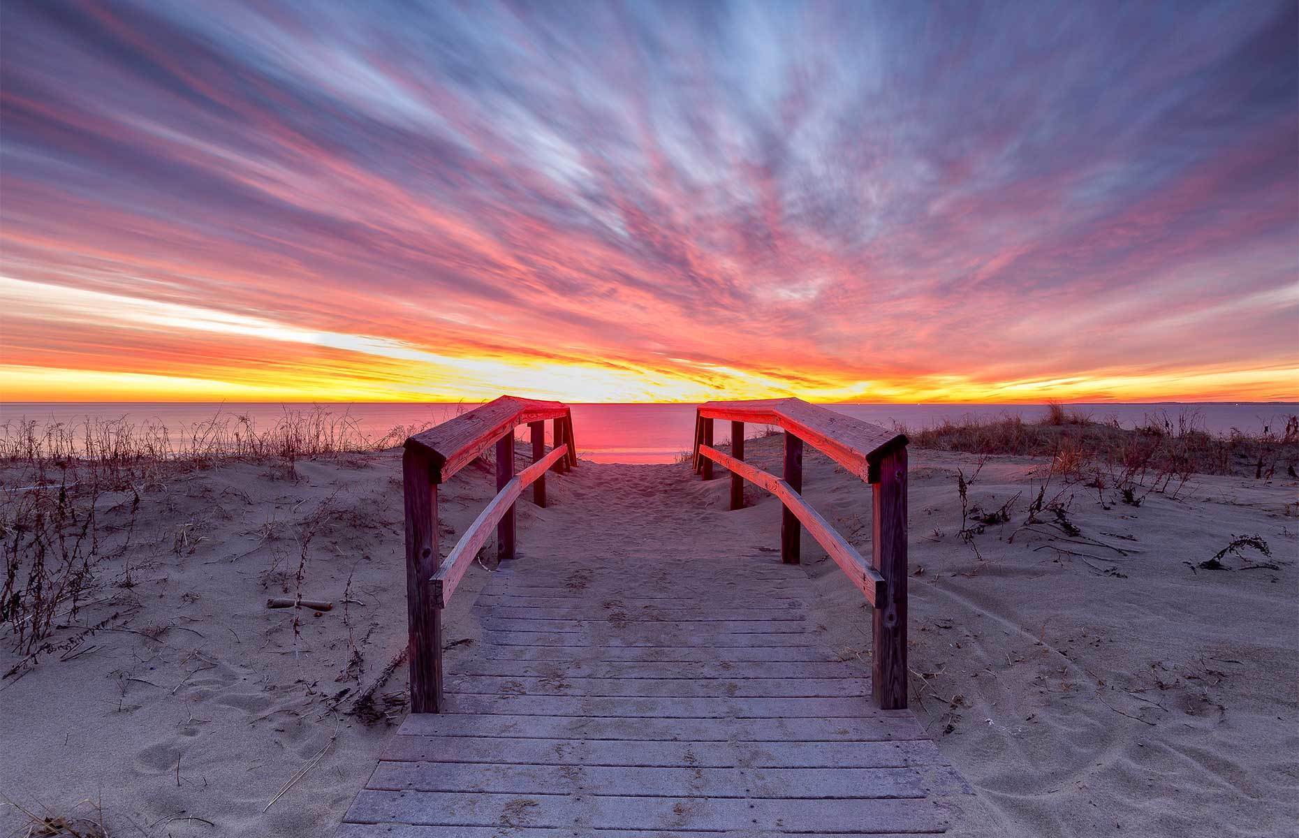 <p class="p1"><span>Catching a sunset in person on Plum Island is nothing short of amazing. Sunrises are just as spectacular. Take advantage of your visit to this island near Newburyport to relax on its lovely beach.</span></p>