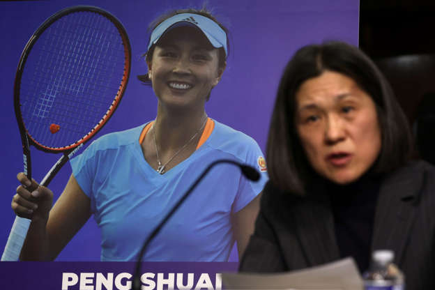 Slide 4 of 31: Meanwhile, Peng Shaui's accusations, disappearance, and eventual reappearance have caught the attention of many human rights activists in the West. Here you can see her image during a US Congress hearing titled “The Beijing Olympics and The Faces of Repression.”