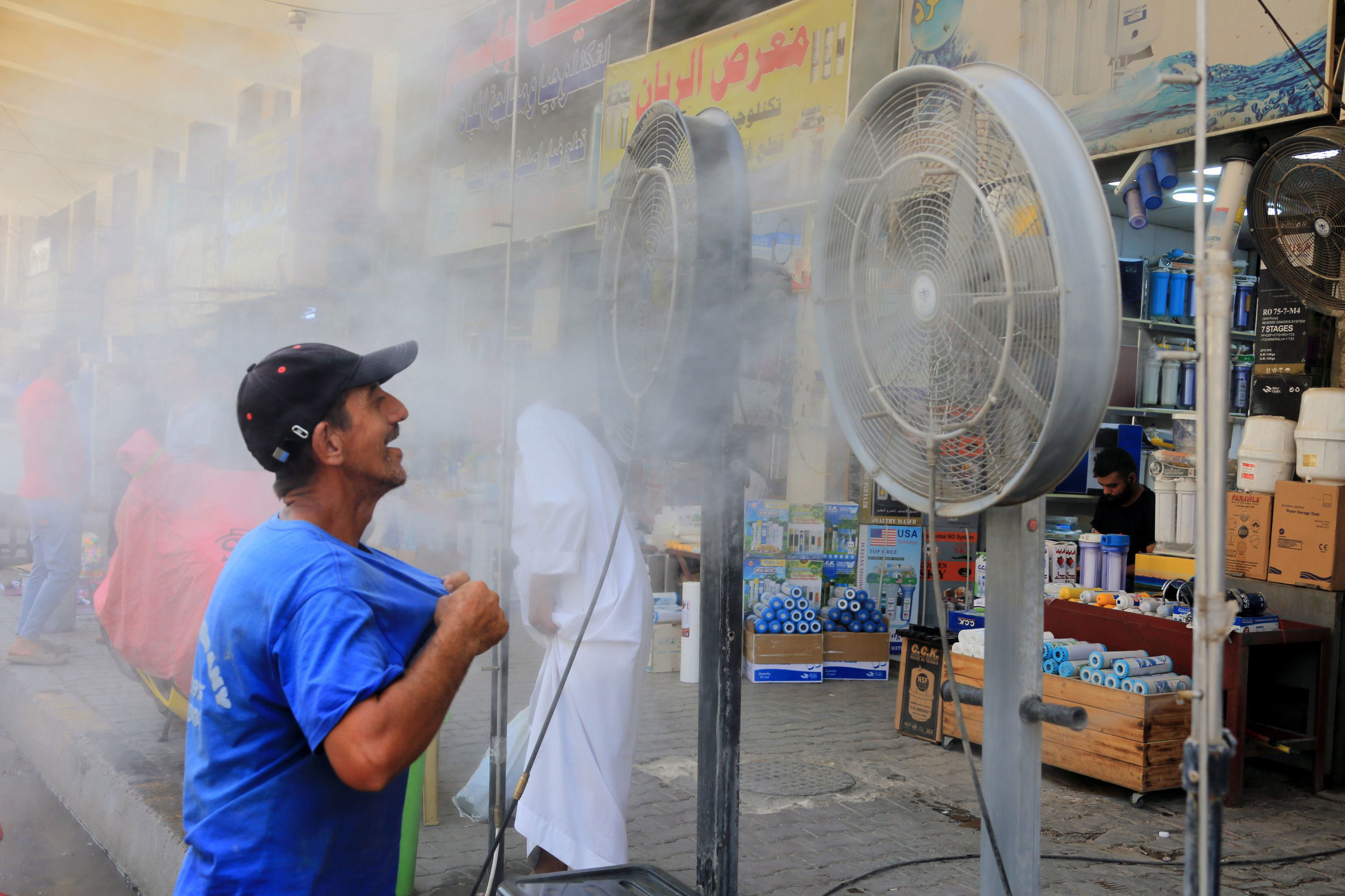 Iraqis Try To Stay Cool During Heatwave — In Pictures