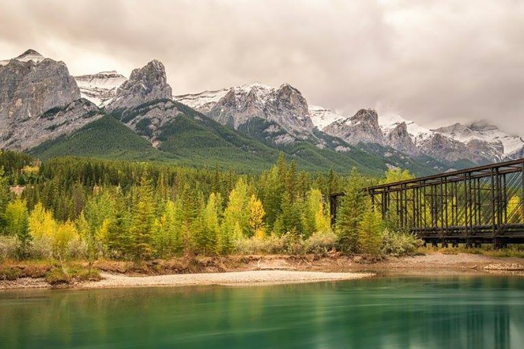 <p>Admire the stunning natural landscape of the Canadian Rockies from the comfort of a train car. A rail journey from Banff to Vancouver (or vice versa) through western Canada's snow-capped mountain region via the top-of-the-line <a href="https://www.rockymountaineer.com">Rocky Mountaineer</a> features gourmet meals, plush seating, and glass-domed observation cars and open-air vestibules for unobstructed views of the region's dramatic peaks and glacier-fed, turquoise lakes. Meals and overnight hotel accommodations are included, and travelers can customize their trips, which run April through October, by booking optional sightseeing tours and cruises to enjoy even more of the breathtaking scenery in and around national parks like Jasper and Banff. </p><p><b>Related:</b> <a href="https://blog.cheapism.com/amazing-train-trips/">40 Spectacular Train Trips Across America and Beyond</a></p>
