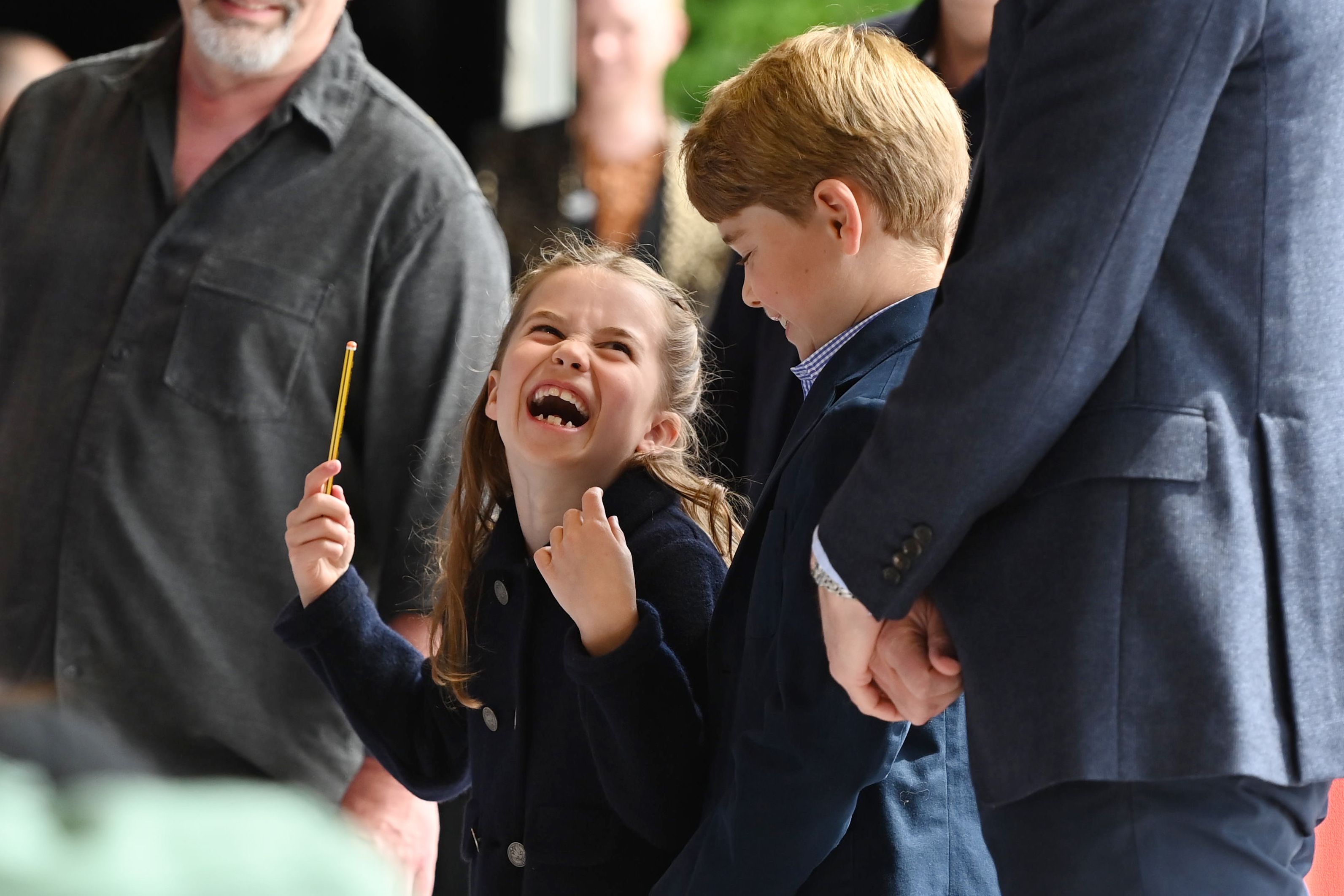 <p>Princess Charlotte laughed as she conducted a band playing "We Don't Talk About Bruno" from Disney's "Encanto" next to brother Prince George during a visit to Cardiff Castle in Wales on June 4, 2022, as part of the royal family's tour for Queen Elizabeth II's <a href="https://www.wonderwall.com/celebrity/royals/platinum-jubilee-see-the-best-photos-from-4-days-of-celebrations-marking-the-queens-70-year-reign-606239.gallery">Platinum Jubilee celebrations</a>.</p>