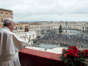 Pope Francis waves to a crowd as he holds his Christmas Urbi et Orbi blessing in St. Peter's Square at The Vatican on Christmas Day in 2021.