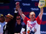 Joey Chestnut eats 63 hot dogs, wins 15th Mustard Belt at Nathan's Hot Dog Eating Contest