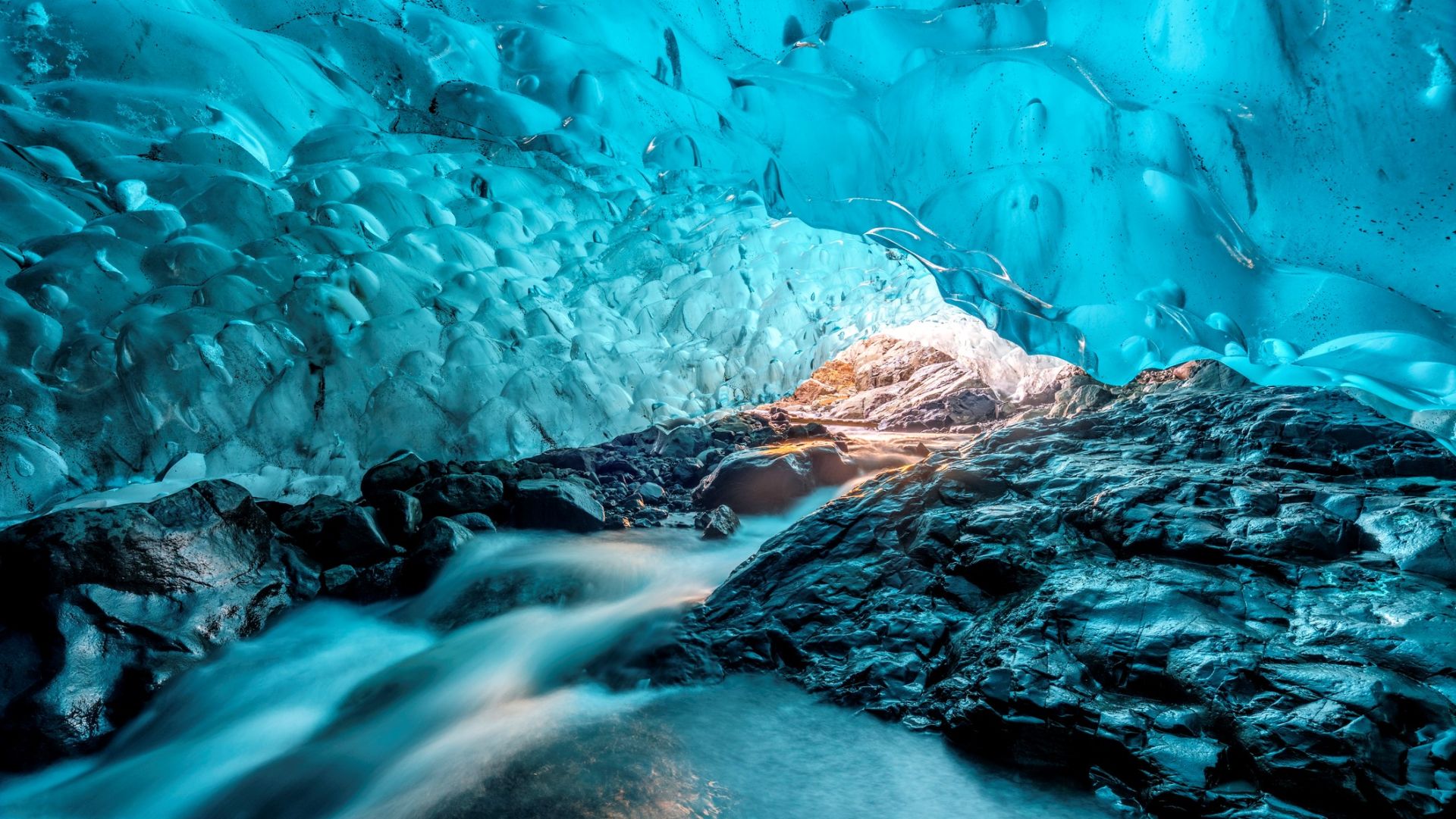 <p>                     Vatnajokull glacier is the second-largest glacier in Europe. It covers 3,130 square miles (8,100 square kilometers) — 8% of Iceland's landmass — according to the travel website Guide to Iceland.                    </p>                                      <p>                     The monumental glacier is over 3,000 feet (900 m) deep in some places and conceals several active volcanoes below its surface, the most famous being Grímsvötn, Öræfajökull and Bárðarbunga. Geologists believe volcanic eruptions from this region are overdue and that we could therefore see significant activity within the next 50 years.                    </p>                                      <p>                     Vatnajökull is also home to enchanting ice caves like the one pictured above, with glacier and ice cave tours available during the winter months.                    </p>                                      <p>                     The glacier is shrinking year by year due to warming global temperatures; its thickness has decreased on average by about 3 feet (0.9 m) per year for the past 15 years.                    </p>