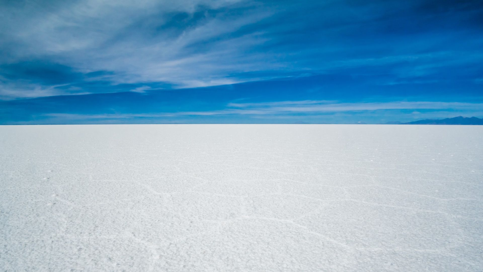 <p>                     The Salar de Uyuni in Bolivia is the largest salt flat in the world, spanning over 3,800 square miles (10,000 sqaure km), according to the European Space Agency The colossal salt flat is so large it can be seen from space.                    </p>                                      <p>                     The salt flat can reach depths of 32 feet (10 m) in its center. According to the travel website Salardeuyuni.com, Salar de Uyuni contains over 10 billion tons of salt. Interestingly, 70% of the world's lithium reserves are also found beneath the monumental salt flat.                    </p>                                      <p>                     These alluring salt flats in Bolivia's surreal Altiplano are a must-visit for those eager to experience something extraordinary.                   </p>