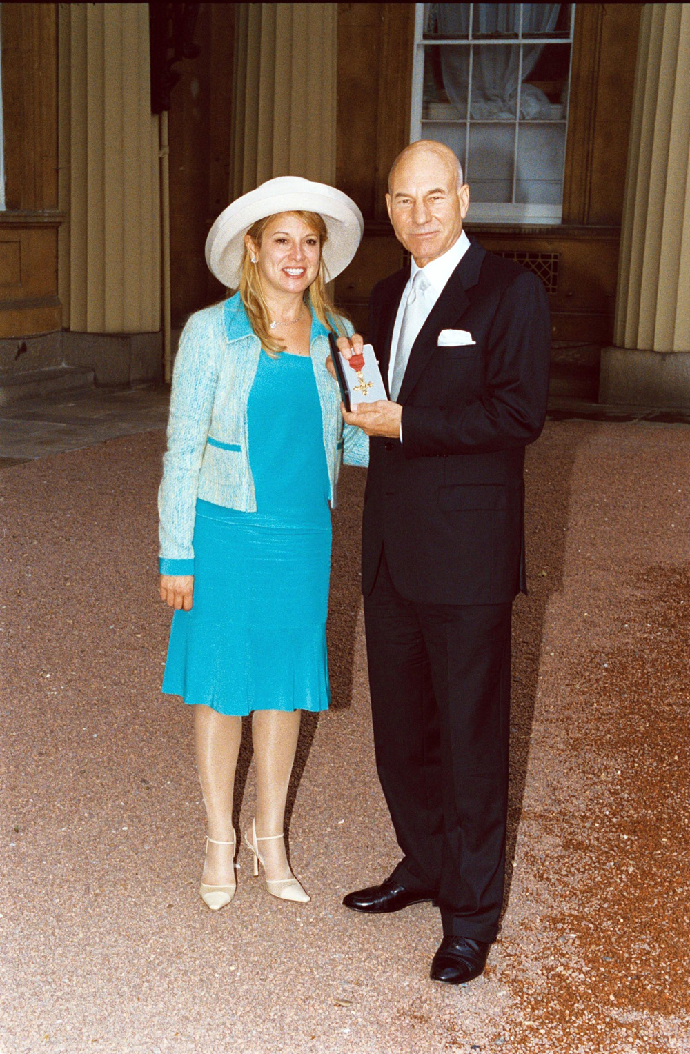 <p>Patrick Stewart and wife Wendy beam after he accepts his OBE honor at Buckingham Palace on Jul. 13, 2001. It was his 61st birthday!</p>
