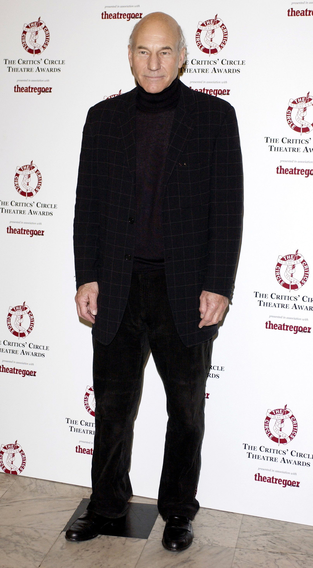 <p>Patrick Stewart is handsome at the Critics Circle Theater Awards in London on Feb. 3, 2004. He gave the cameras a shy smile.</p>