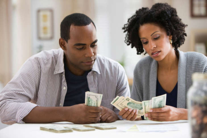 Couple counting money