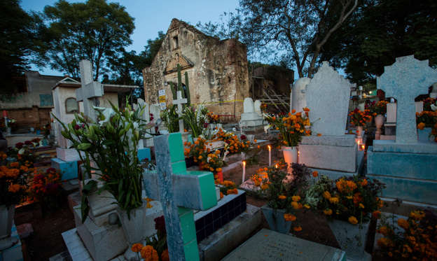 Slide 2 of 35: Santa Cruz Xoxocotlan cemetery in Mexico's state of Oaxaca