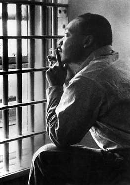 Slide 9 de 27: Various - 1960s Martin Luther King Jnr sitting in the Jefferson County Jail, in Birmingham, Alabama - 11 March 1967