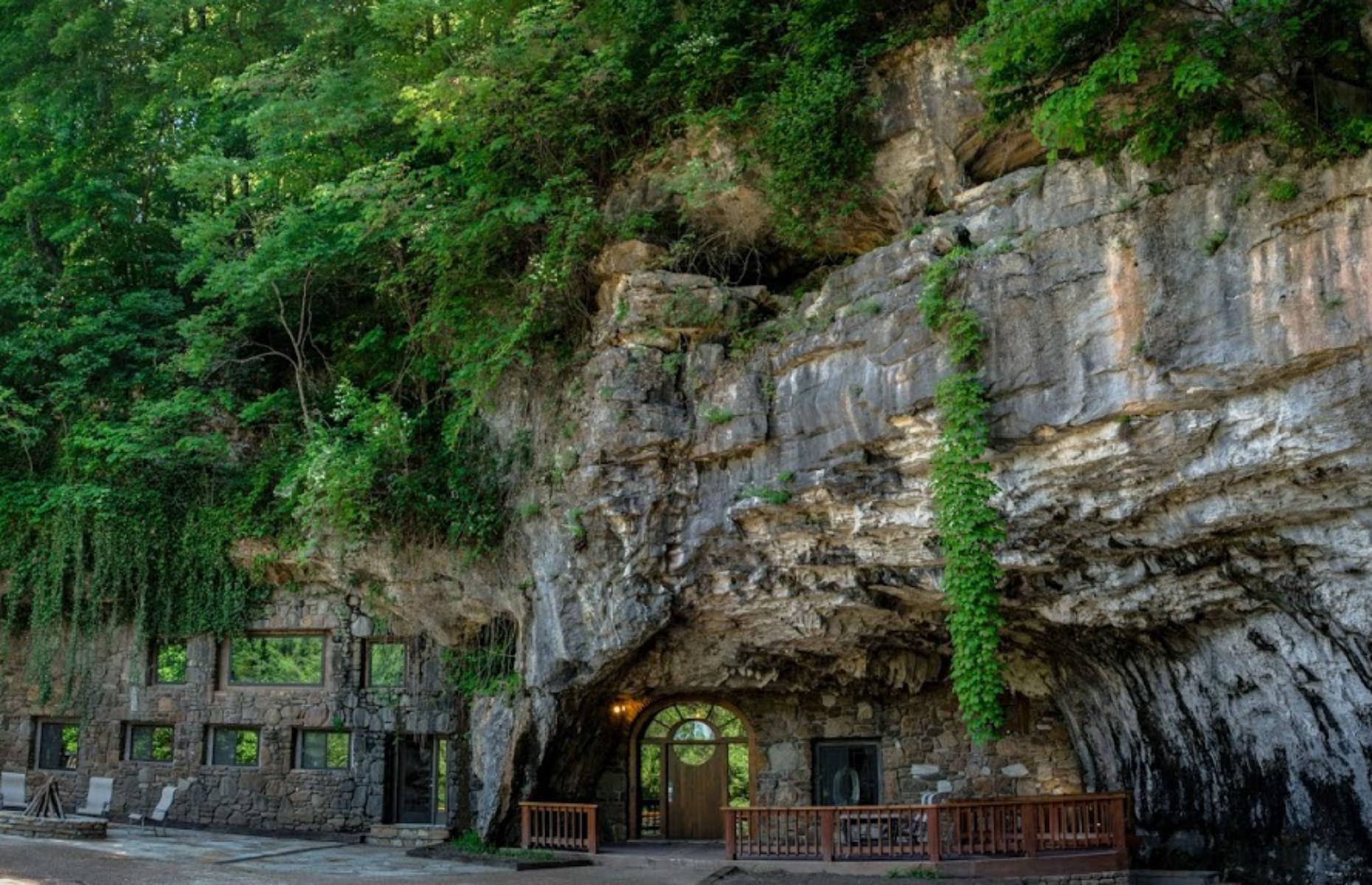 Slide 33 of 54: Located in Parthenon, Arkansas, this Flintstones-style home is built into a cave, and has been purposely renovated in a way to keep the features of the cave and its authenticity.
