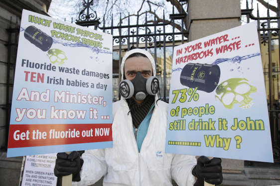 Slide 18 of 25: Gerry Keoghan protesting about Flouride in drinking water outside Leinster House in Dublin.