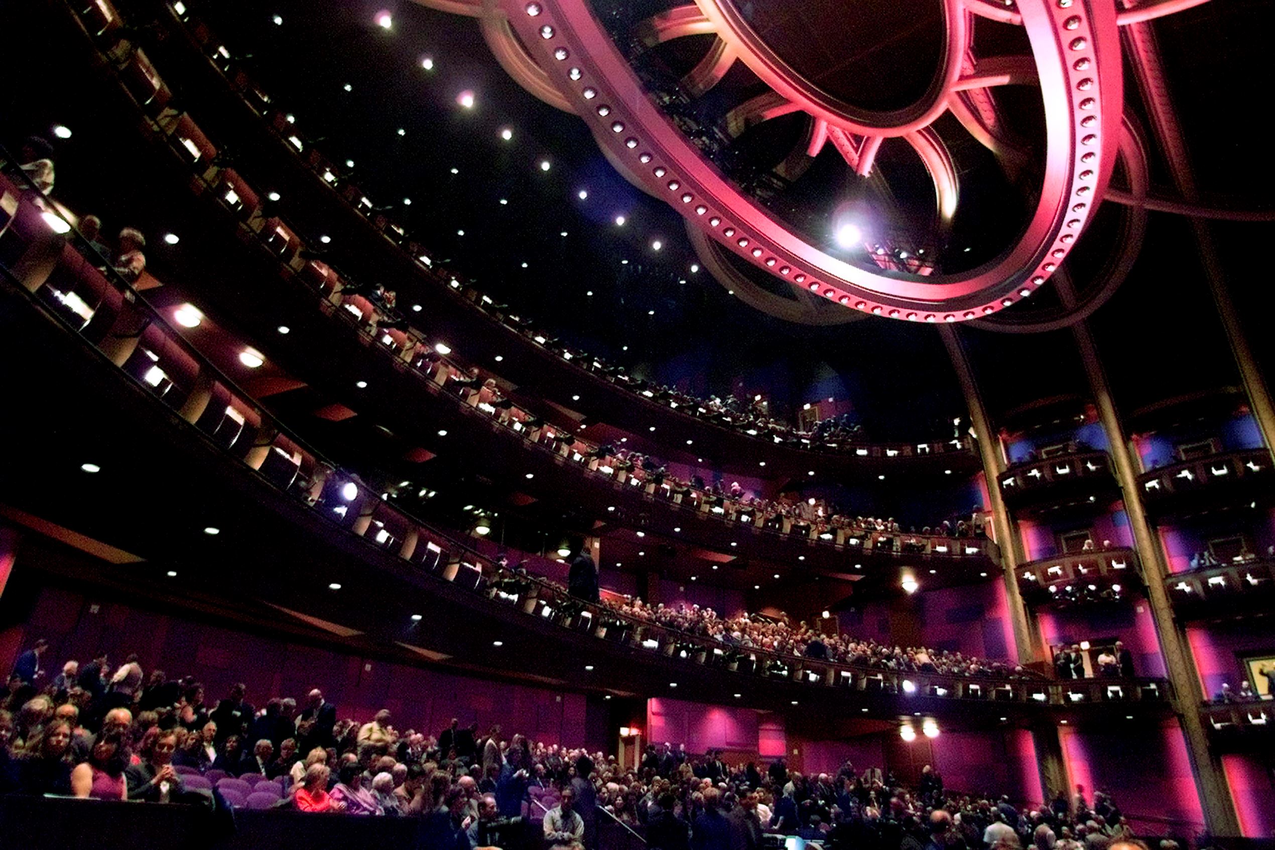 Slide 10 of 10: The opening night audience is seated at the new Kodak Theatre at the Hollywood & Highland entertainment and shopping complex in Hollywood November 9, 2001. British tenor Russell Watson was the first performer to appear on stage at the theatre. The $615 million project features 70 shops and restaurants with  the 3,300 seat Kodak Theatre also being the permanent home of the Academy Award telecast.
