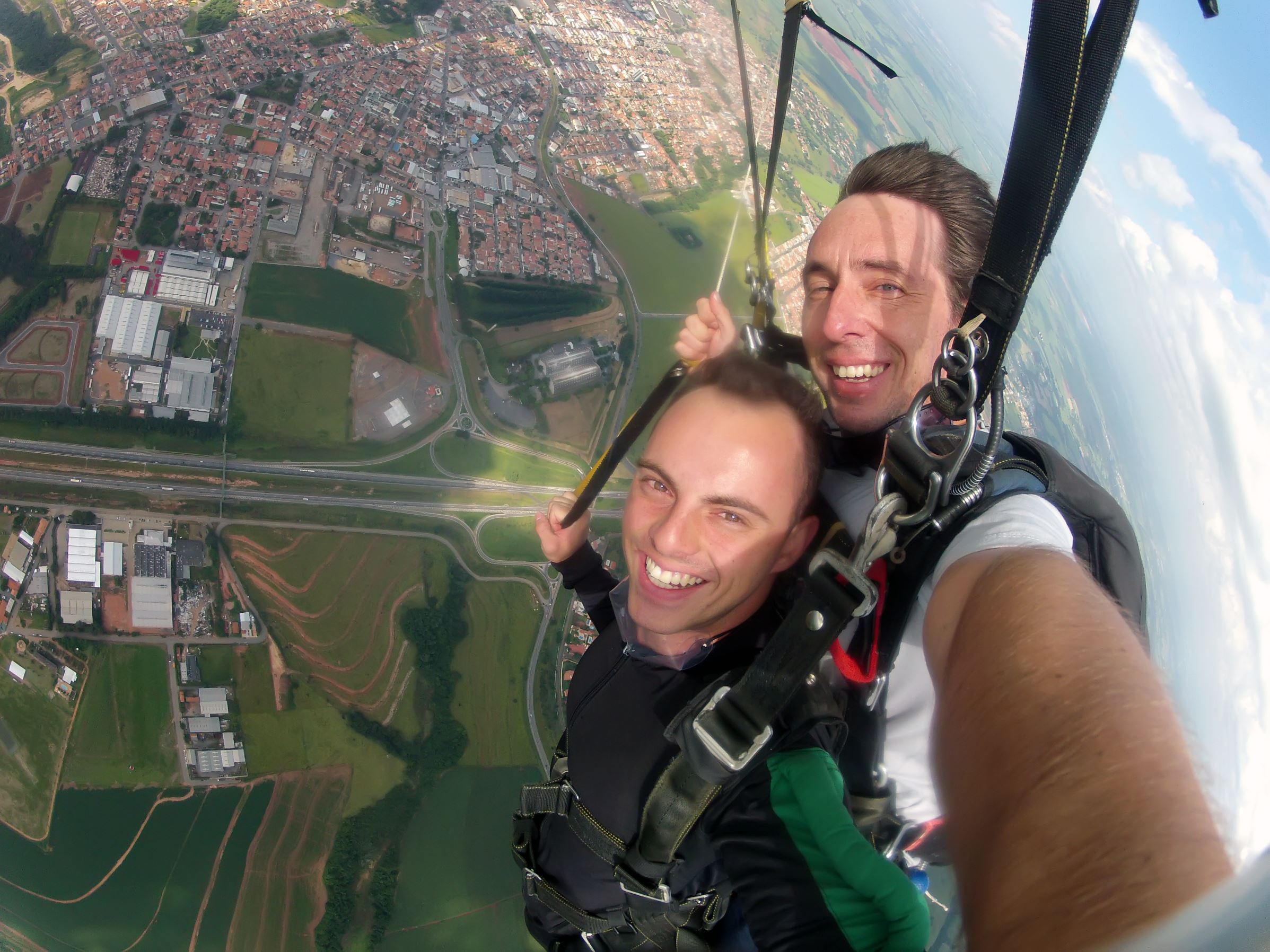 Self portrait with hand cam of Tandem Skydiving
