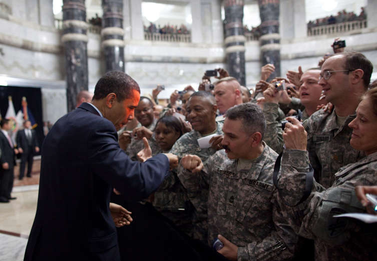Slide 7 de 95: April 7, 2009: “President Obama fist-bumps a U.S. soldier at Camp Victory in Baghdad. The President was treated to an overwhelming reception by the troops.”