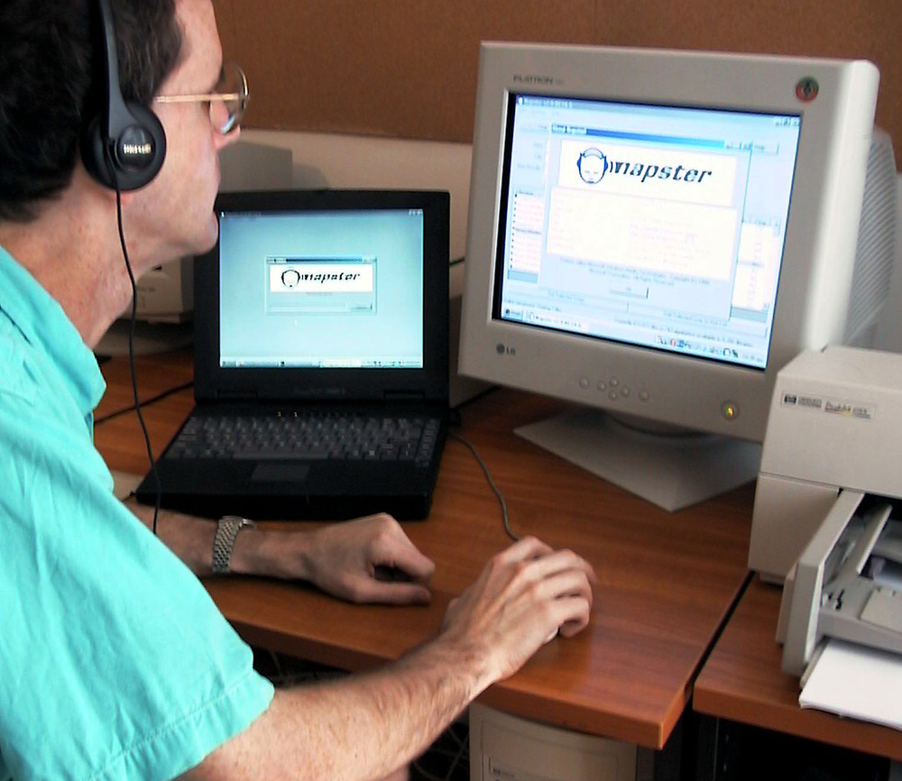 BUDAPEST, HUNGARY - JULY 28: An unidentified man accesses the Napster web site on July 28, 2000 in Budapest Hungary. Napster worked as a clearinghouse - pointing users to computers where songs in MP3 format could be downloaded.