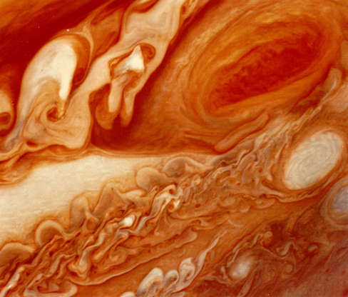 Slide 65 of 86: 1979: The Great Red Spot on the planet Jupiter and the turbulent region to the west, as seen by the space probe Voyager 1. (Photo by MPI/Getty Images) Restrictions