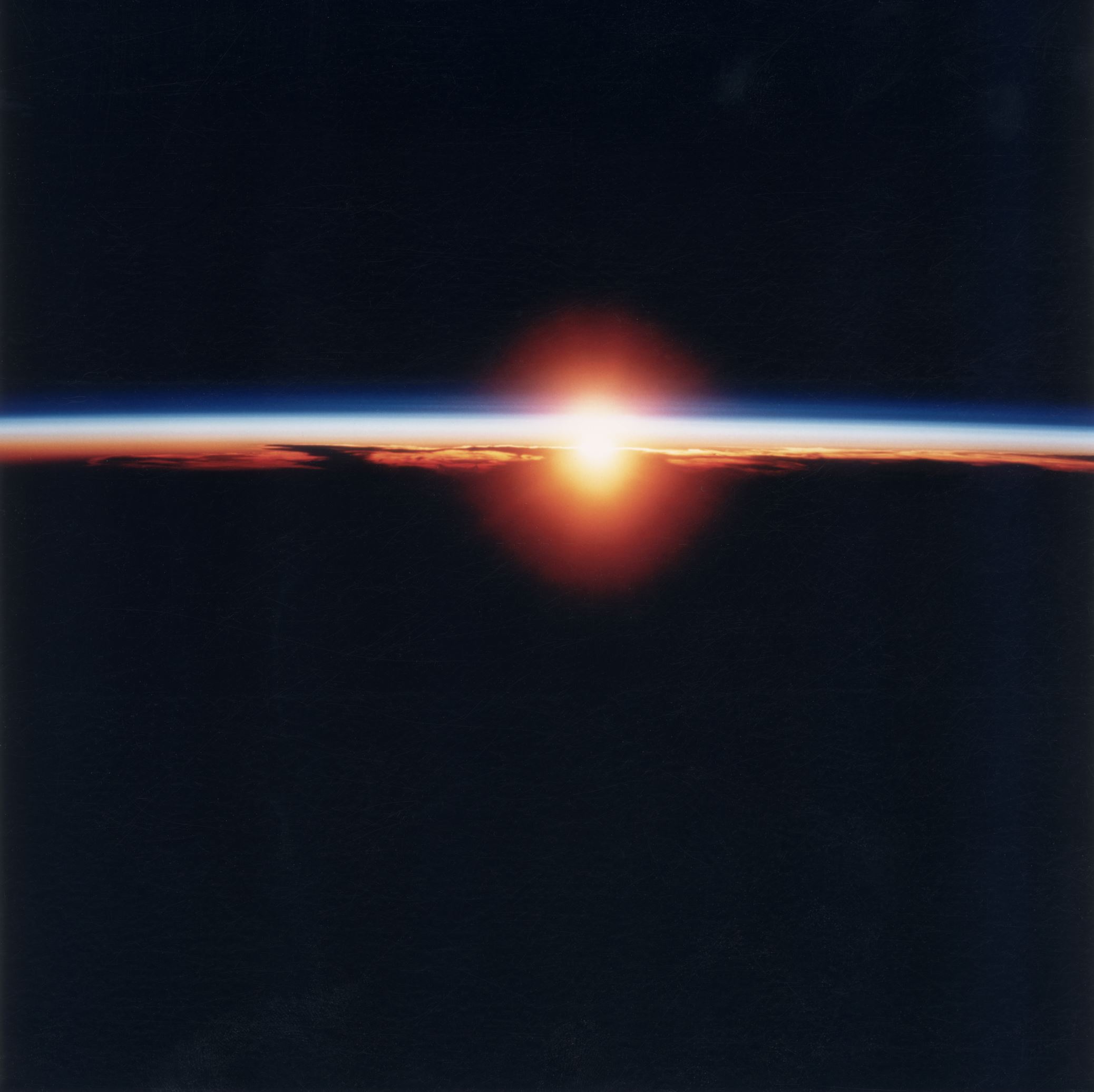 Slide 58 of 86: Sunrise over the West Indies, as seen from the space shuttle Discovery during NASA's STS-70 mission, July 1995. (Photo by Space Frontiers/Getty Images)