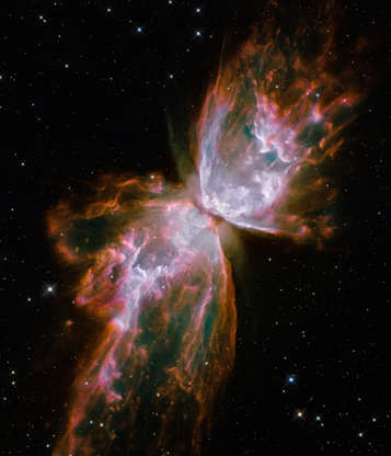 Slide 41 of 86: IN SPACE - JULY 27: In this image provided by NASA, ESA, and the Hubble SM4 ERO Team, a planetary nebula named NGC 6302, also known as, Butterfly Nebula and Bug Nebula, in the Scorpius constellation is pictured July 27, 2009 in Space. Today, September 9, 2009, NASA released the first images taken with the Hubble Space Telescope since its repair in the spring. (Photo by NASA, ESA, and the Hubble SM4 ERO Team via Getty Images)