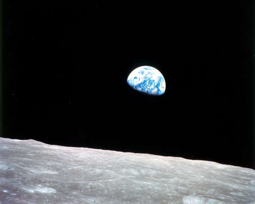 Slide 11 of 81: Apollo 8, the first manned mission to the moon, entered lunar orbit on Christmas Eve, Dec. 24, 1968. That evening, the astronauts-Commander Frank Borman, Command Module Pilot Jim Lovell, and Lunar Module Pilot William Anders-held a live broadcast from lunar orbit, in which they showed pictures of the Earth and moon as seen from their spacecraft. Said Lovell, "The vast loneliness is awe-inspiring and it makes you realize just what you have back there on Earth." They ended the broadcast with the crew taking turns reading from the book of Genesis.