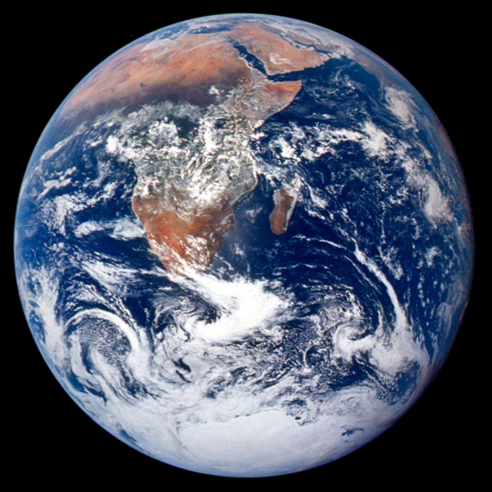 Slide 67 of 86: File Photo: The Crew Of Apollo 17 Took This Photograph Of Earth In December 1972 While The Spacecraft Was Traveling Between The Earth And The Moon. The Orange-Red Deserts Of Africa And Saudi Arabia Stand In Stark Contrast To The Deep Blue Of The Oceans And The White Of Both Clouds And Snow-Covered Antarctica. (Photo By Nasa/Getty Images)