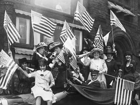 Slide 6 of 15: Suffragettes hold a jubilee celebrating their victory. Miss Melanie Lowenthal who was one of the leaders of the demonstration celebrating the dawn of political equality.