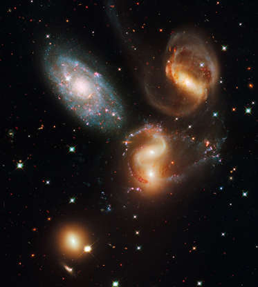 Stephan's Quintet - NASA/Getty Images Slide 82 of 86: IN SPACE - JULY/AUGUST 2009: In this composite image provided by NASA, ESA, and the Hubble SM4 ERO Team, Stephan's Quintet (HCG 92) in the Pegasus constellation is pictured in Space. Today, September 9, 2009, NASA released the first images taken with the Hubble Space Telescope since its repair in the spring. (Photo by NASA, ESA, and the Hubble SM4 ERO Team via Getty Images)