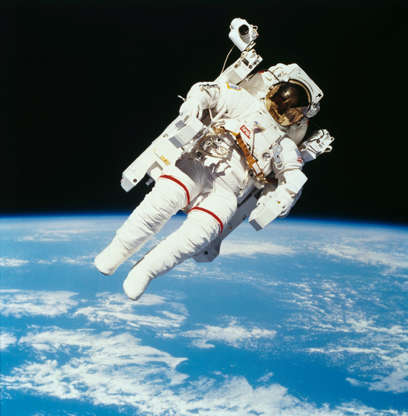 Slide 64 of 86: American astronaut Bruce McCandless II photographed from the Space Shuttle Challenger during the first untethered EVA, made possible by his nitrogen jet propelled backpack (Manned Manuevering Unit or MMU), 7th February 1984. (Photo by NASA/Space Frontiers/Getty Images)