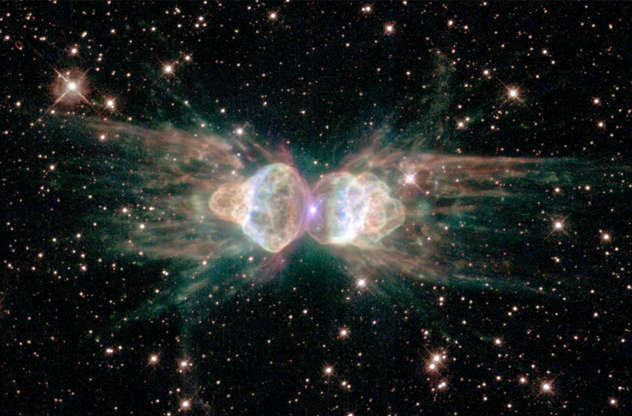 Hubble Image of 'Ant Nebula' - NASA/Newsmakers/Getty Images Slide 51 of 86: 385221 01: A Hubble Space Telescope image released February 1, 2001 of the so-called 'ant nebula' (Menzel 3, or Mz3) reveals the 'ant's' body as a pair of fiery lobes protruding from a dying star. The Hubble images directly challenge old ideas about the last stages in the lives of stars. By observing Sun-like stars as they approach their deaths, the Hubble Heritage image of Mz3, along with pictures of other planetary nebulae, shows that our Sun's fate probably will be more interesting, complex, and striking than astronomers imagined just a few years ago. (Photo by NASA/Newsmakers)