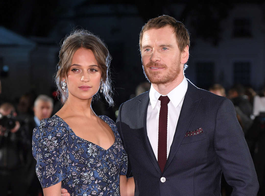 Slide 1 of 60: LONDON, ENGLAND - OCTOBER 19: Alicia Vikander and Michael Fassbender arrive for the UK premiere of 'The Light Between Oceans' at The Curzon Mayfair on October 19, 2016 in London, England. (Photo by Karwai Tang/WireImage)