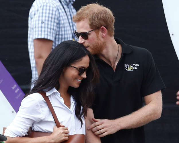 Prince Harry arrives with girlfriend Markle