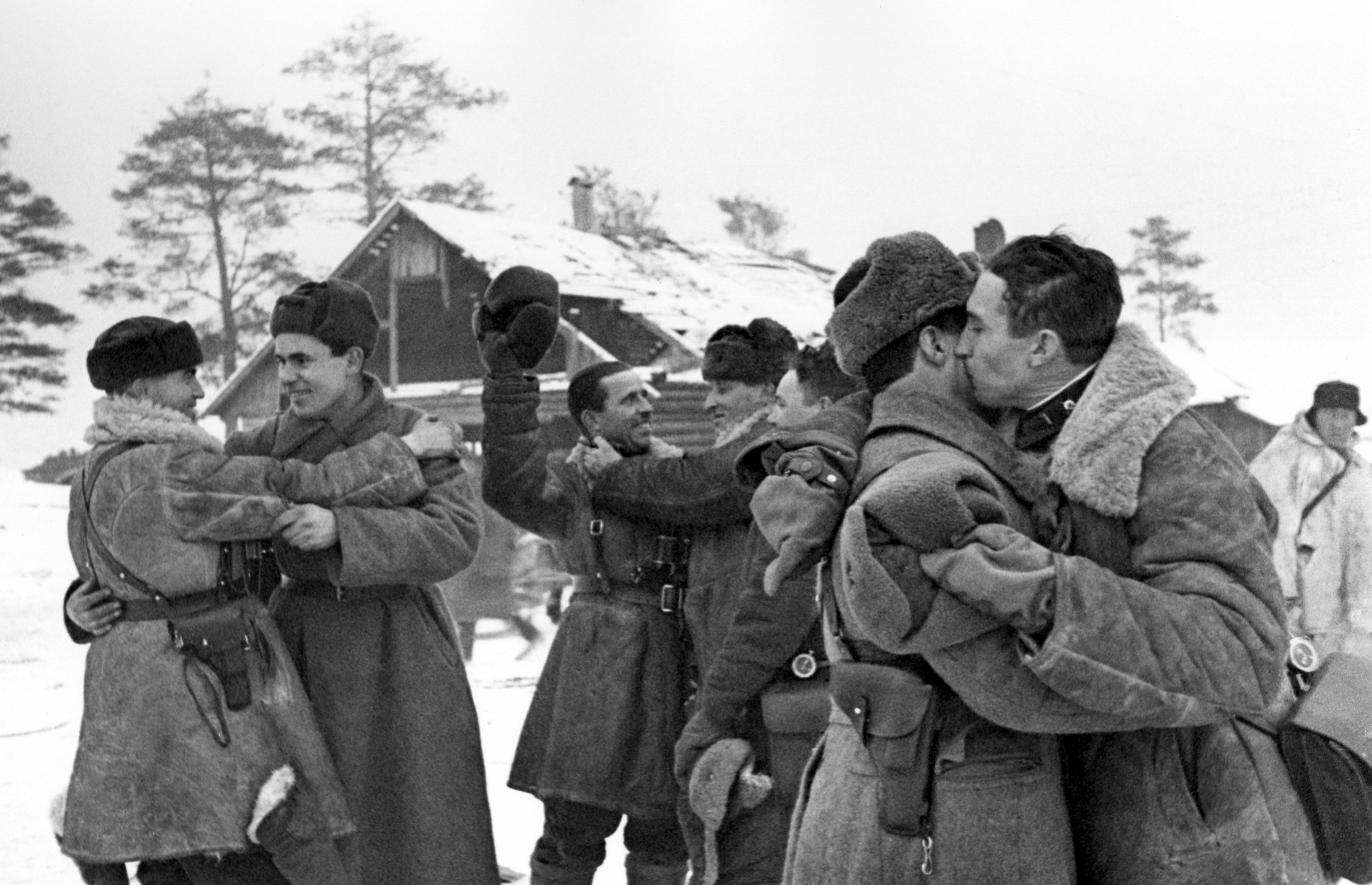 Leningrad Region, Soviet Union. Soldiers and officers of the Volkhov and Leningrad Fronts meet and hug after managing to open a narrow land corridor in the Siege of Leningrad in the Second World War. Semyon Nordshtein/TASS (Photo by TASS via Getty Images)
