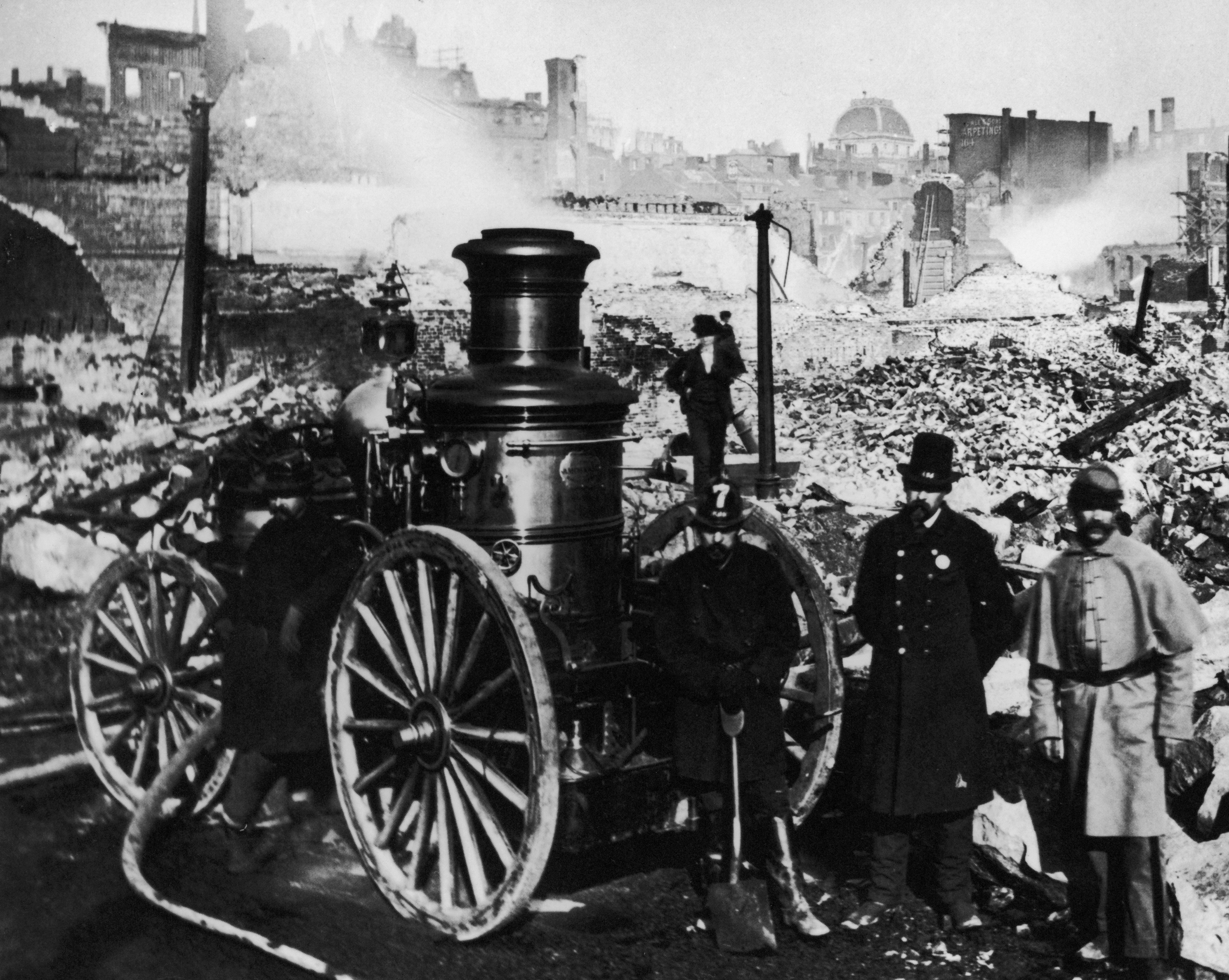 Slide 1 of 10: Firemen stand amidst the rubble after the Great Boston Fire of November 1872. (Photo by FPG/Hulton Archive/Getty Images) ** http://www.history.com/this-day-in-history/fire-rips-through-boston http://on-this-day.com/onthisday/thedays/alldays/nov09.htm https://en.wikipedia.org/wiki/Great_Boston_fire_of_1872