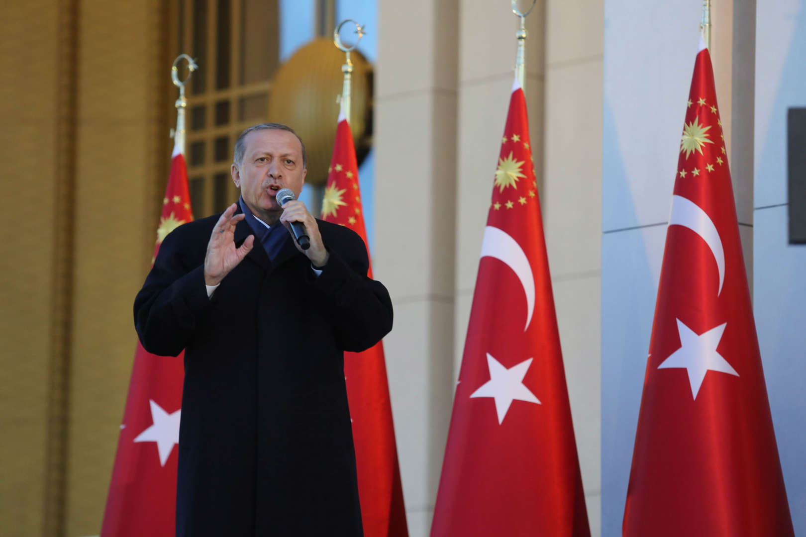 Διαφάνεια 14 από 36: Turkish President Tayyip Erdogan gives a referendum victory speech to his supporters at the Presidential Palace on April 17, 2017 in Ankara Turkey. Erdogan declared victory in Sunday's historic referendum that will grant sweeping powers to the presidency, hailing the result as a 'historic decision.