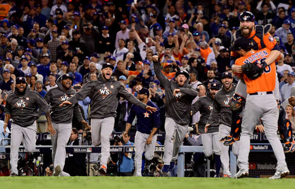 Slide 1 of 61: The Houston Astros celebrate defeating the Los Angeles Dodgers 5-1 in game seven to win the 2017 World Series at Dodger Stadium on November 1, 2017 in Los Angeles, California.