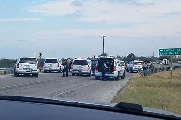 Police cars are seen at Sutherland Springs, Texas on Nov. 5, 2017 in this picture obtained from social media.