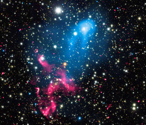 Composite image - Chandra X-ray Observatory/NASA/Handout via Reuters Slide 26 of 86: A composite image released by NASA on January 5, 2017 contains X-rays from Chandra (blue), radio emission from the GMRT (red), and optical data from Subaru (red, green, and blue) of the colliding galaxy clusters called Abell 3411 and Abell 3412. These and other telescopes were used to analyze how the combination of these two powerful phenomena can create an extraordinary cosmic particle accelerator. NASA/Chandra X-ray Observatory/Handout via REUTERS ATTENTION EDITORS - THIS IMAGE WAS PROVIDED BY A THIRD PARTY