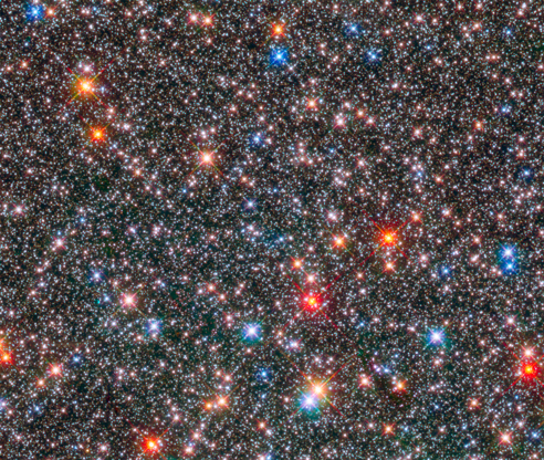 Milky Way - T. Brown (STScI)/ESA/NASA Slide 86 of 86: This Hubble Space Telescope image of a sparkling jewel box full of stars captures the heart of our Milky Way galaxy. The image is a composite of exposures taken in near-infrared and visible light with Hubble’s Wide Field Camera 3. The observations are part of two Hubble surveys: the Galactic Bulge Treasury Program and the Sagittarius Window Eclipsing Extrasolar Planet Search.