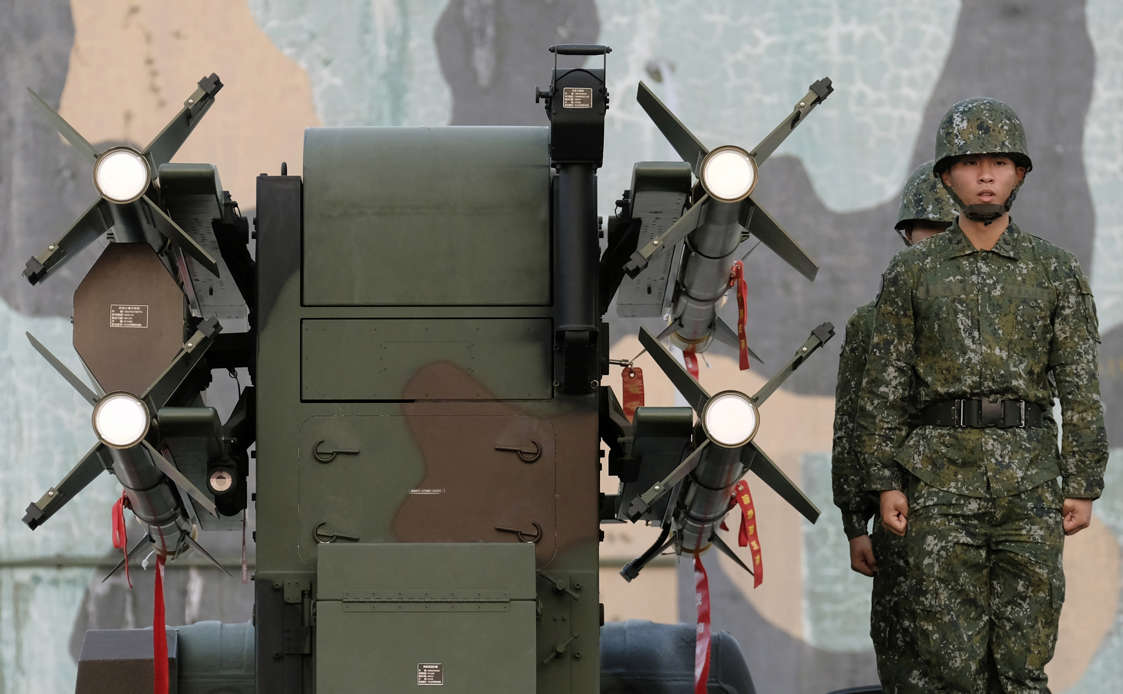 Slide 26 of 51: Taiwan soldiers stand next to home-made Tien Chien surface-to-air missiles during an annual drill in Tainan on January 17, 2017. Taiwan began two days of military drills on January 17 simulating an attack by China as the government sought to reassure the public in the face of deteriorating relations with Beijing. / AFP / Sam YEH (Photo credit should read SAM YEH/AFP/Getty Images)