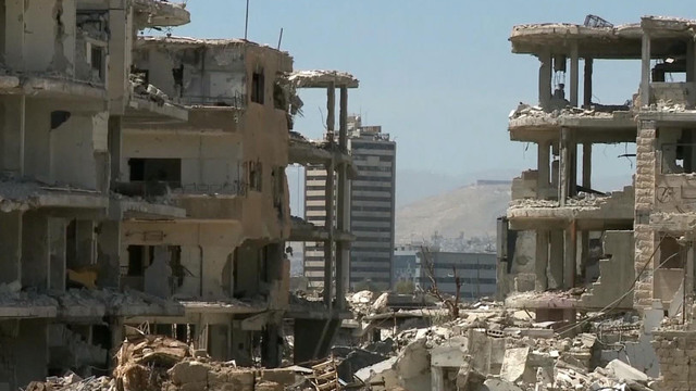 a large building: A look at the aftermath of Syria airstrike