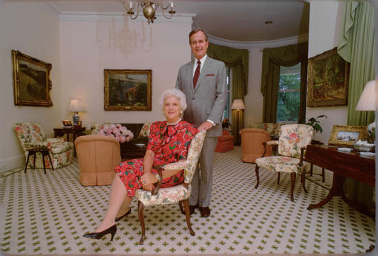 Slide 10 of 28: U.S. Vice President George H.W. Bush and Mrs. Barbara Bush at the Vice President's residence circa 1983 in Washington.
