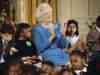 First lady Barbara Bush is joined by Washington area school children during a children?s Christmas party at the White House in Washington Wednesday, Dec. 11, 1991. From left are, David Hoai, second grader, Long Branch School, Arlington, Va., Christina Nance, second grader, Concord Elementary School, Forestville, Md., Mrs. Bush; and Yogita Tailor, third grader, Carole Highlands Elementary School, Takoma Park, Md.