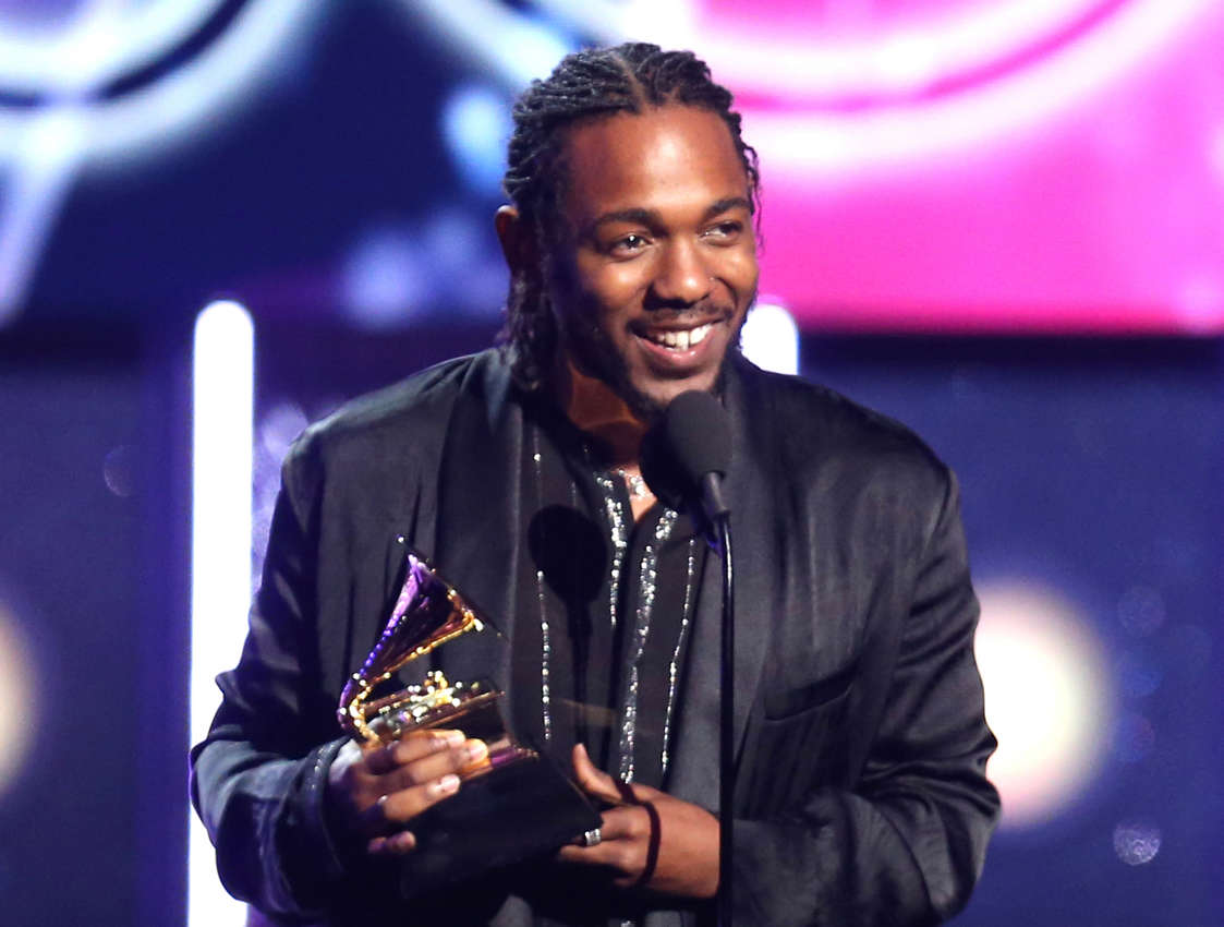 FILE - In this Jan. 28, 2018 file photo, rapper Kendrick Lamar accepts the award for best rap album for "Damn" at the 60th annual Grammy Awards in New York. On Monday, April 16, 2018, Lamar won the Pulitzer Prize for music for his album "Damn." (Photo by Matt Sayles/Invision/AP, File)