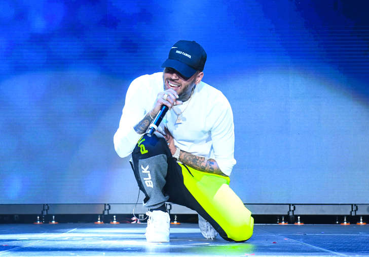 Singer Chris Brown performs onstage at 3rd Annual V-103 Winterfest Concert at Philips Arena on December 16, 2017 in Atlanta, Georgia.