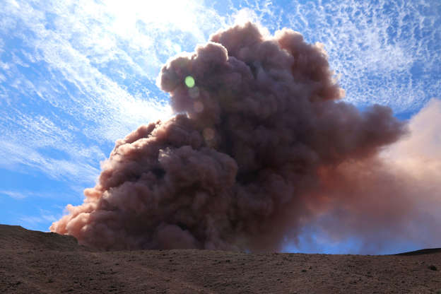 HawaiiVolcano - U.S. Geological Survey/AP Slide 1 of 11: In this photo released by U.S. Geological Survey, a plume of ash rises from the Puu Oo vent on Hawaii's Kilaueaa Volcano after a magnitude 5.0 earthquake, Thursday, May 3, 2018 in Hawaii Volcanoes National Park. Hawaii's Kilauea volcano erupted Thursday, sending lava shooting into the air in a residential neighborhood and prompting mandatory evacuation orders for nearby homes. Hawaii County said steam and lava poured out of a crack in Leilani Estates, which is near the town of Pahoa on the Big Island. (U.S. Geological Survey via AP)