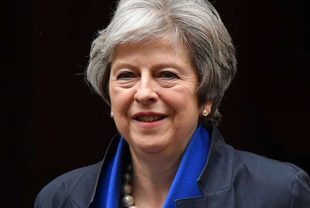 Britain's Prime Minister Theresa May leaves 10 Downing Street in central London on May 2, 2018, as she heads to the weekly Prime Minister's Questions (PMQs) session in the House of Commons. (Photo by Ben STANSALL / AFP)        (Photo credit should read BEN STANSALL/AFP/Getty Images)
