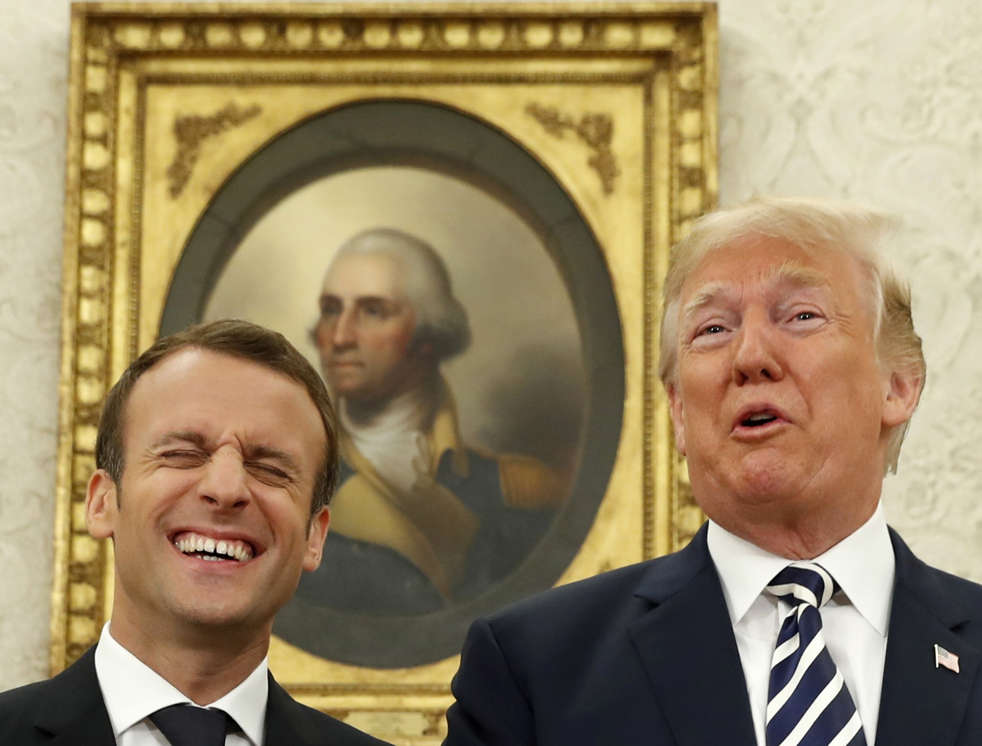 Slide 1 of 29: French President Emmanuel Macron (L) laughs as U.S. President Donald Trump speaks during their meeting in the Oval Office following the official arrival ceremony for Macron at the White House in Washington, U.S., April 24, 2018.