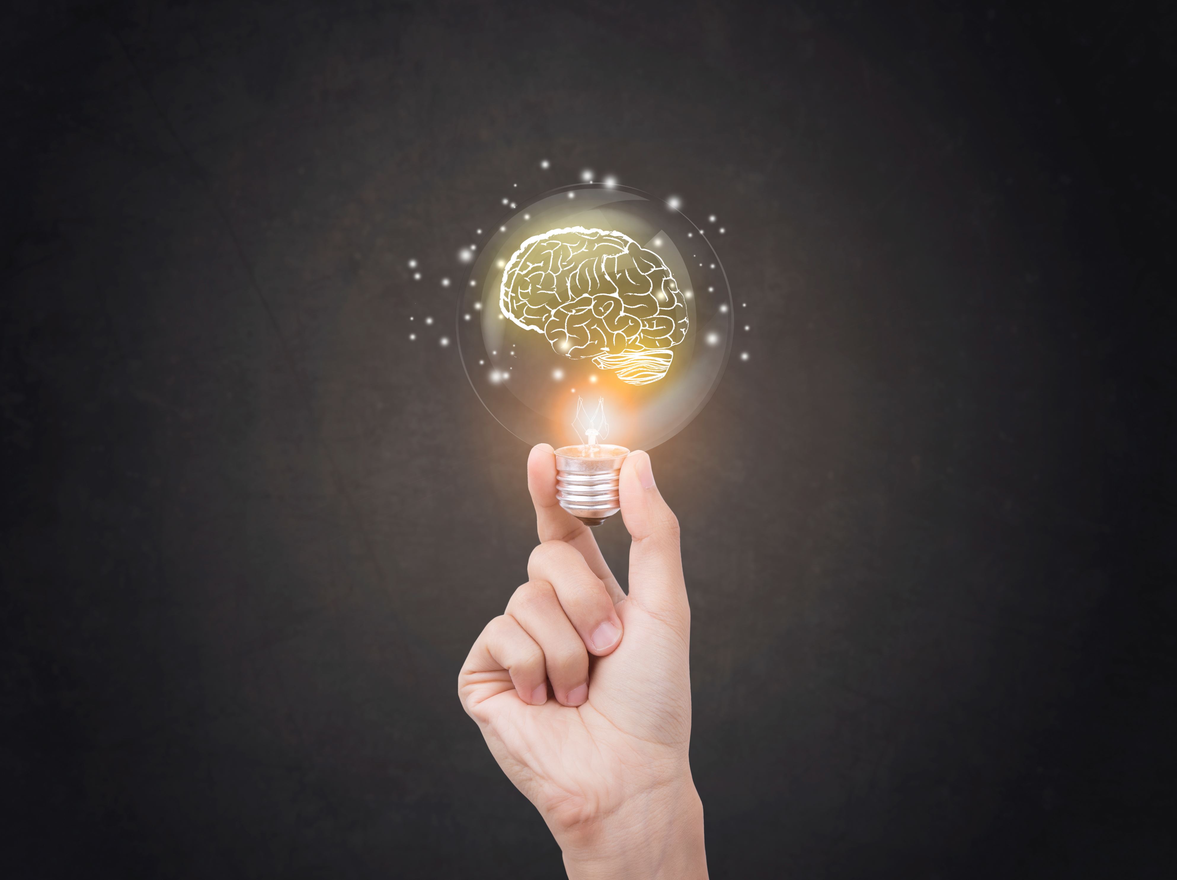 Slide 3 de 21: lightbulb brainstorming creative idea abstract icon on business hand.