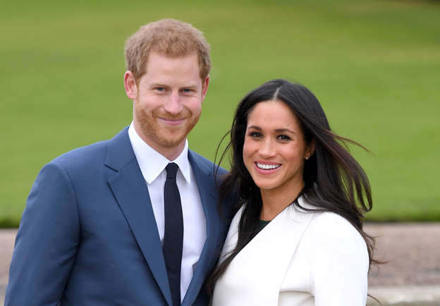 Prince Harry, Meghan Markle are posing for a picture