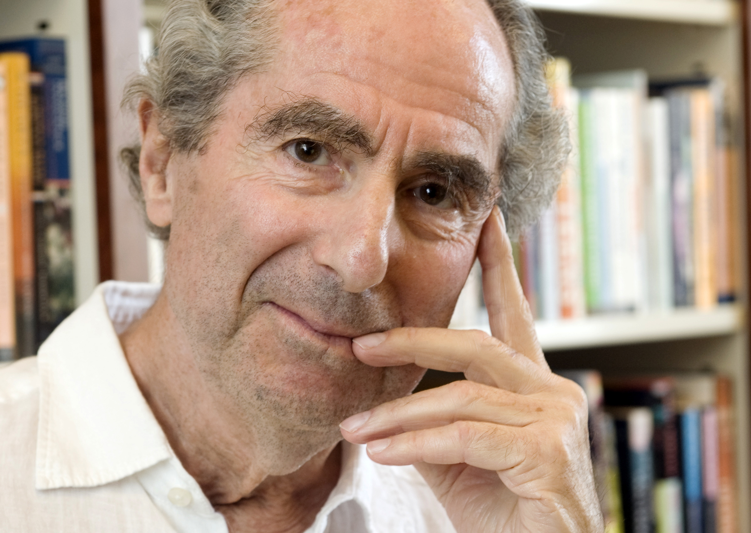 Slide 59 of 158: FILE - In this Sept. 8, 2008, file photo, author Philip Roth poses for a photo in the offices of his publisher, Houghton Mifflin, in New York. Roth, prize-winning novelist and fearless narrator of sex, religion and mortality, has died at age 85, his literary agent said Tuesday, May 22, 2018. (AP Photo/Richard Drew, File)